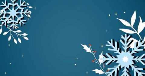 Christmas snowflakes on blue background with ample copy space
