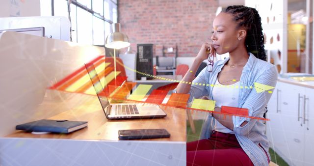 Confident African American Businesswoman Analyzing Data on Laptop - Download Free Stock Images Pikwizard.com