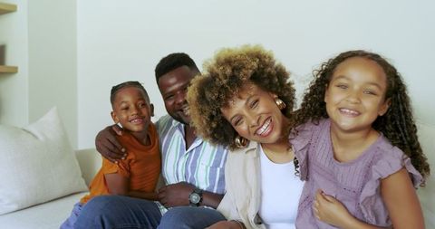 Smiling African American Family Sharing Quality Time Together