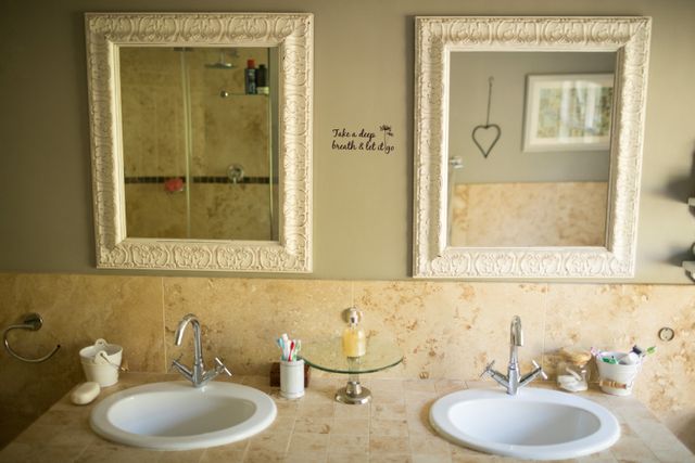 Mirror over sinks in bathroom