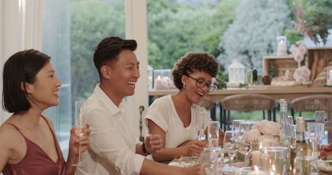 Champagne Toast Celebration Among Friends at Outdoor Wedding