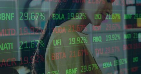 Businesswoman analyzing stock market projections overlay