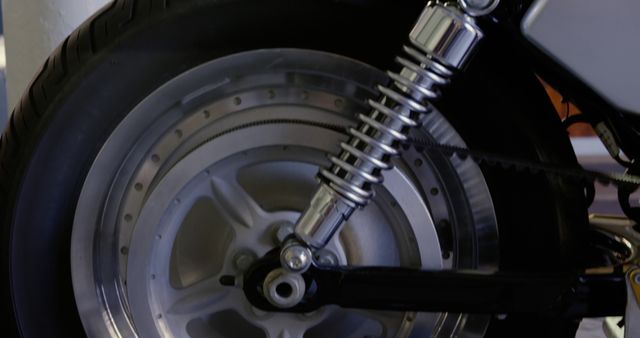 Close-up of Motorcycle Rear Wheel with Shock Absorber - Download Free Stock Images Pikwizard.com