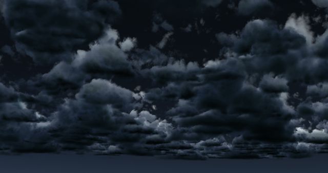 Dark clouds fill night sky creating a moody and dramatic scene. Perfect for background use in weather-related presentations, dramatic video projects, or atmospheric designs.