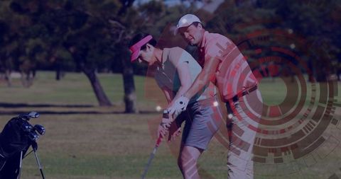 Golf instructor guiding woman adjusting swing position in leisure landscape