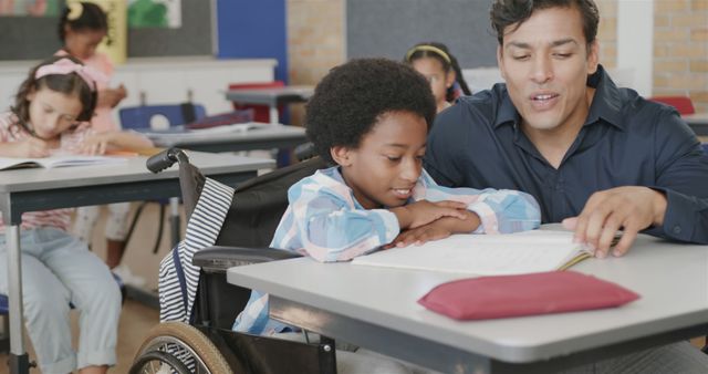 Teacher Assisting Student in Wheelchair in Diverse Classroom Setting - Download Free Stock Images Pikwizard.com