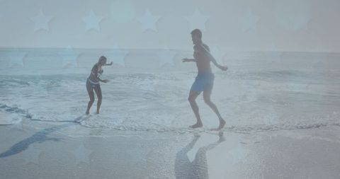 Romantic Couple Enjoying Playful Beach Day with Overlay