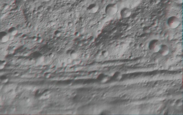 This anaglyph image shows the topography of part of Vesta equatorial region. These craters are classed as ruin eroded craters and are most clear in the center of the image, above the troughs. You need 3D glasses to view this image.