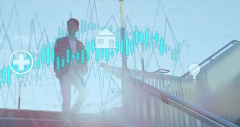 Backlit commuter standing on stairway watching overlaid market charts with lens flare