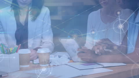 Diverse Professionals Collaborating on Technological Concepts