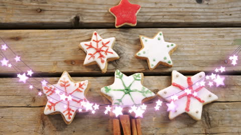 Holiday Cookies with Festive Lights Adorning Rustic Table