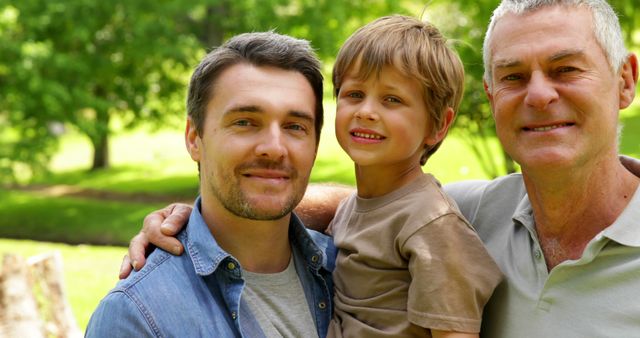 Three generations of men smiling  on a sunny day - Download Free Stock Photos Pikwizard.com