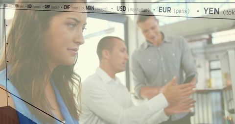 Business Team Analyzing Currency Market Data with Digital Interface