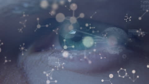 Close-Up of Eye with Digital Data and Molecular Graphics Overlay