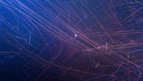 Streaming Neon Light Trails Across Dark Space Long Exposure Abstract Background