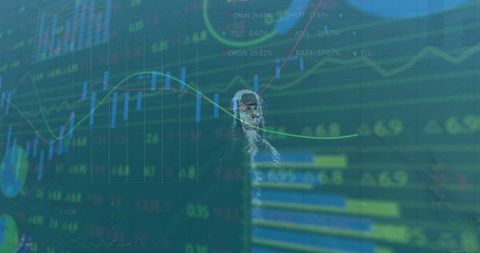 Businessman analyzing digital stock market data on monitors