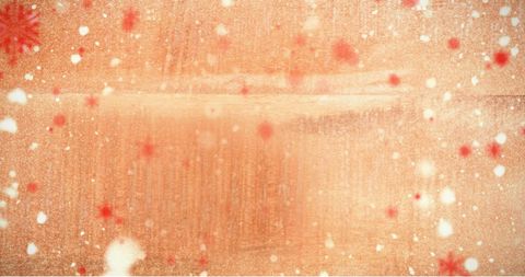 Abstract orange background with light and dust particles