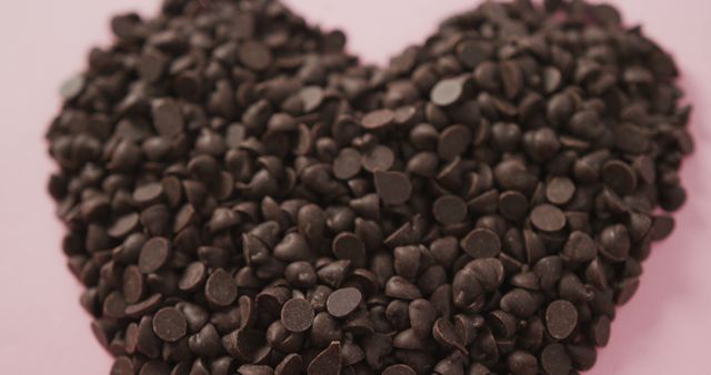 Heart-Shaped Pile of Dark Chocolate Chips - Download Free Stock Images Pikwizard.com