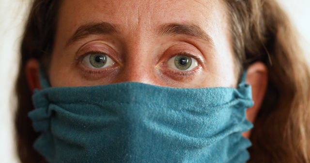 Close-up of woman wearing homemade fabric face mask - Download Free Stock Images Pikwizard.com