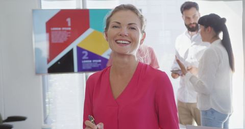 Confident Businesswoman Smiling in Collaborative Office - Download Free Stock Images Pikwizard.com