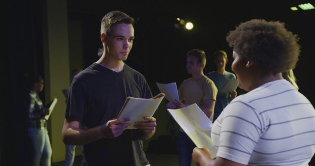 Diverse Group of Young Adults Rehearsing Script on Stage - Download Free Stock Images Pikwizard.com