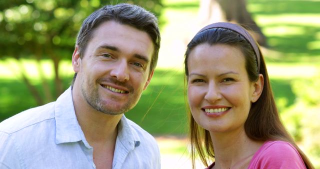 Smiling Couple Enjoying Outdoor Park - Download Free Stock Images Pikwizard.com