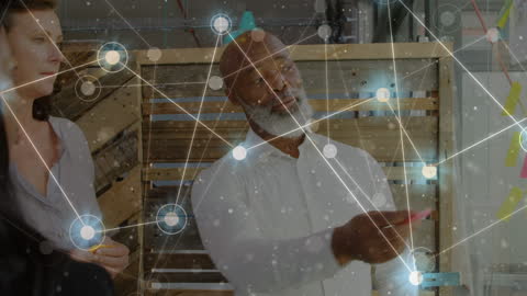 Business Team Brainstorming with Digital Network Overlay