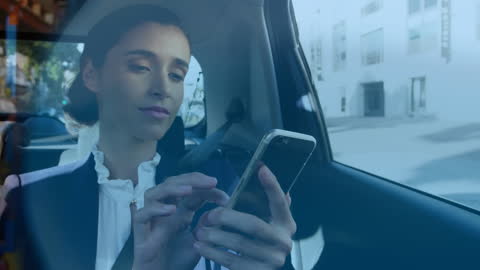 Businesswoman Using Smartphone in Car for Tech-Savvy Commuting