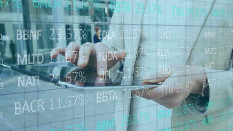 Businesswoman Using Tablet for Data Analysis in Modern Office