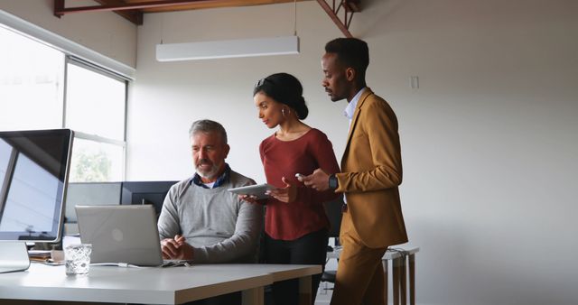 Business Team Collaborating on Office Project with Laptop and Tablet - Download Free Stock Images Pikwizard.com