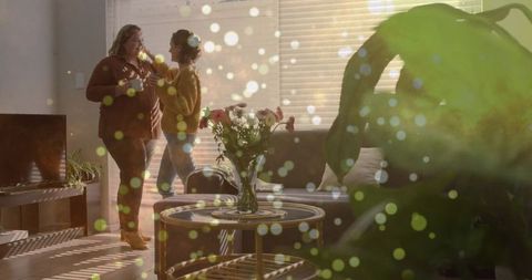 Two Women Relaxing with Coffee in Comfortable Living Room