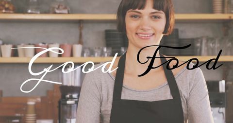 Smiling Female Chef in Kitchen with Good Food Text Overlay