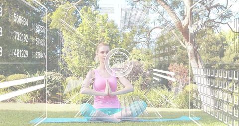 Woman practicing outdoor meditation using augmented reality wellness hud in sunlit garden