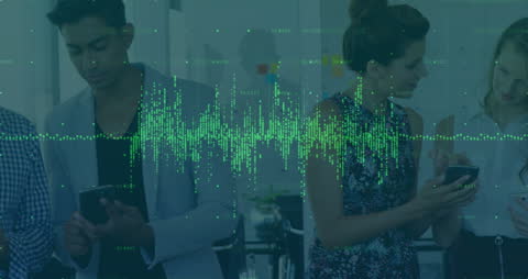 Diverse Team Engaging With Digital Data in Office