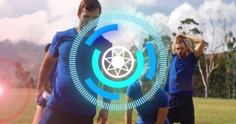 Team training with futuristic HUD overlay warming up on grassy field boosting fitness performance