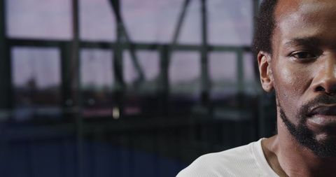 Man Enjoying Indoor Padel Tennis with Copy Space