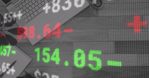 Overlay of digital stock data on office workspace