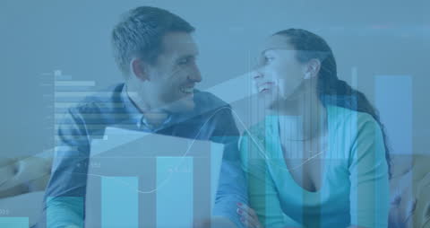 Couple Discussing Finances with Digital Graphical Overlay