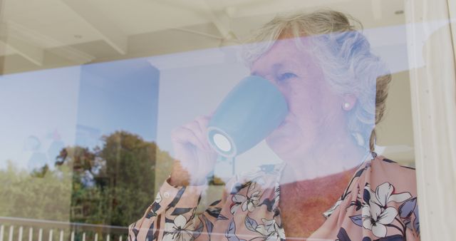 Senior Woman Drinking Coffee at Home Through Window - Download Free Stock Images Pikwizard.com