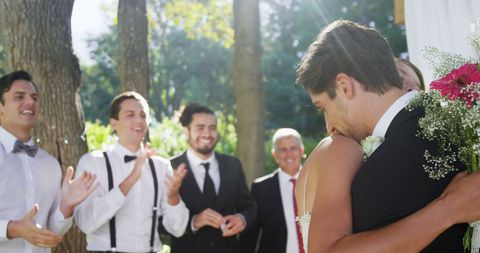 Bride and Groom Embracing at Scenic Wedding Ceremony - Download Free Stock Images Pikwizard.com