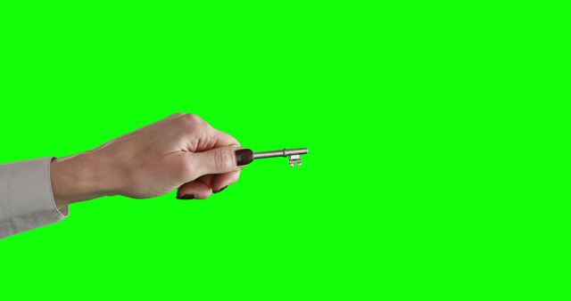 Woman Holding Silver Key on Green Screen Background - Download Free Stock Images Pikwizard.com