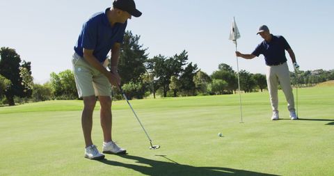 Seniors Enjoying Golf Game on Sunny Day in Nature - Download Free Stock Images Pikwizard.com