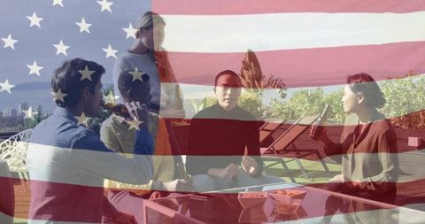 Friends enjoying rooftop gathering with drinks and snacks under american flag overlay