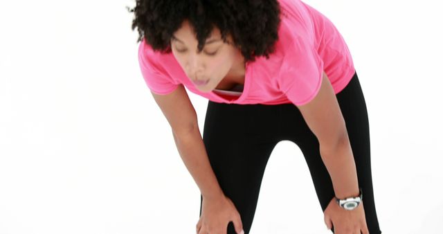 Tired Woman in Activewear Taking a Break from Exercise - Download Free Stock Images Pikwizard.com