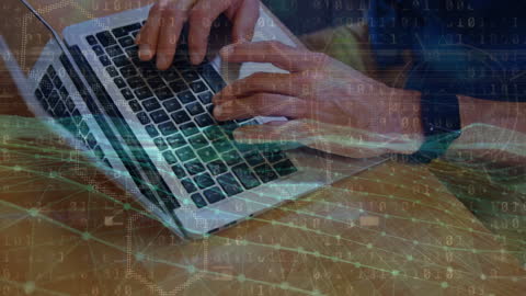 Hacker's Hands Typing on Laptop with Digital Overlay in Cyber World