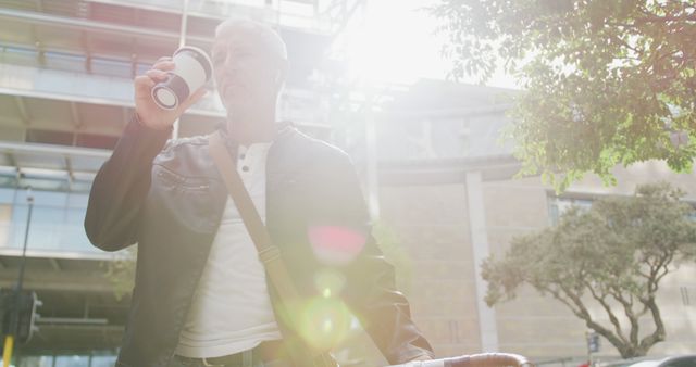 Mature Man Drinking Coffee Outdoors on Sunny Day - Download Free Stock Images Pikwizard.com