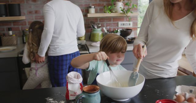 Family in Kitchen with Children Baking Together and Enjoying Morning - Download Free Stock Images Pikwizard.com