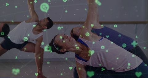Trio practicing barre yoga with digital health hud overlay for fitness tracking