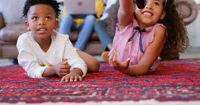 Children Relaxing on Red Carpet in Living Room - Download Free Stock Images Pikwizard.com