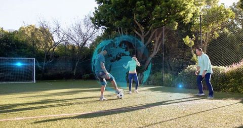 Adults playing backyard soccer with holographic globe overlay augmented reality fitness scene
